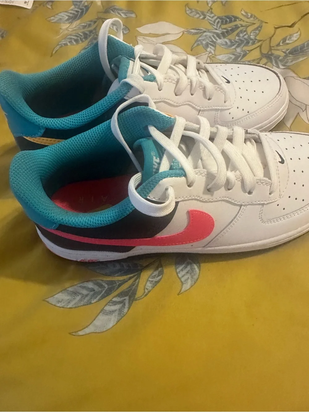 Nike Kids White Low-Top Sneakers with Teal and Pink Accents